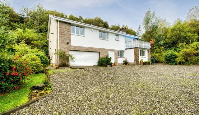 A fantastic large house at the head of Loch Long in the village of Arrochar.