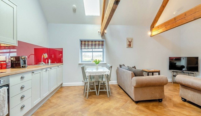 A lovely 1st floor apartment with views towards the open fields.