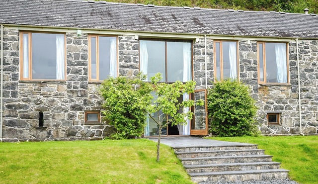 A modern cottage, set in a stone barn not far from Dolgellau and Llwyngwril.