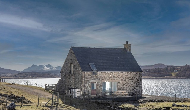 A secluded Skye boathouse where rugged beauty meets refined coastal living.