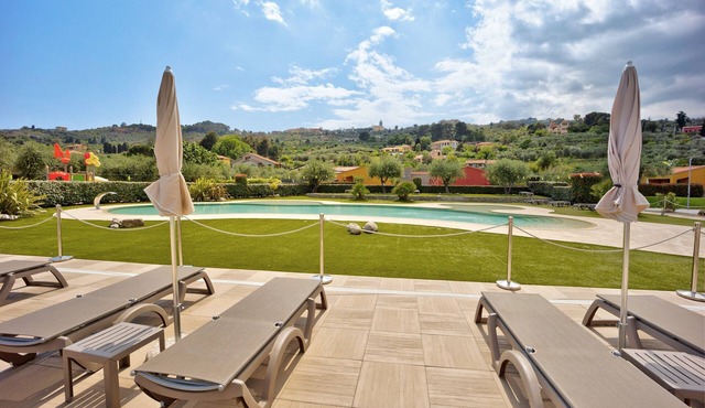 Apartment 'Monolocale Rebi' with Shared Pool, Garden and Wi-Fi