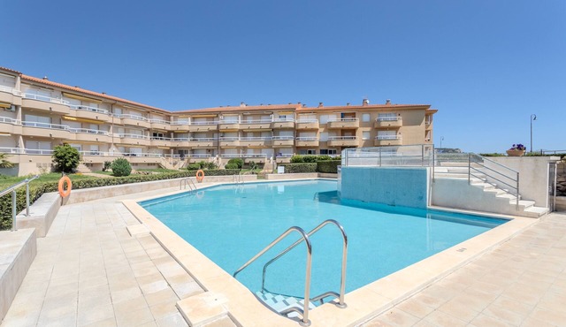 Apartment 'Sunrise Medes' with Sea View, Shared Pool and Wi-Fi