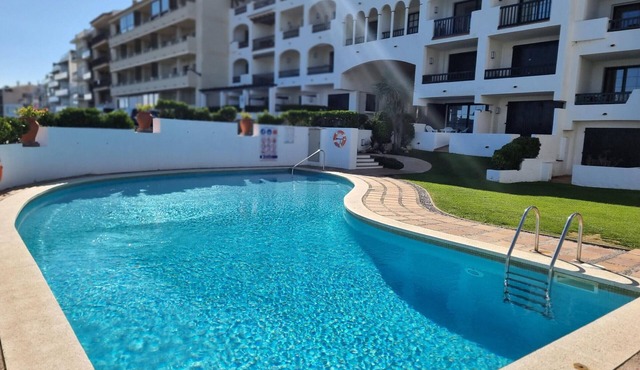 Apartment with sea view terrace and pool 50m from the beach