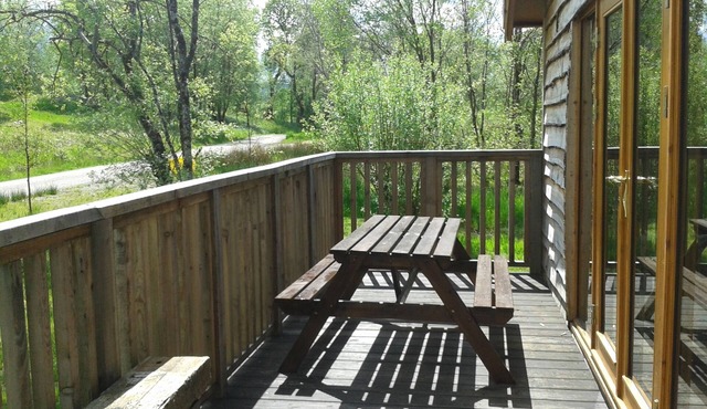 BRACKEN is a beautiful log cabin with lovely outlook over open meadow.