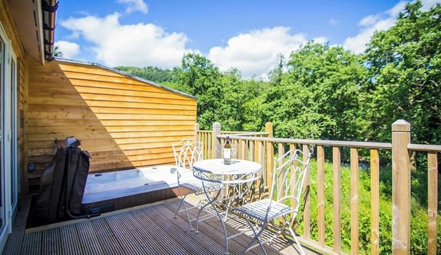 Cosy Riverside Escape with Hot Tub | Garth Cottage