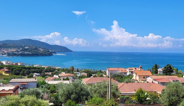 Ground floor apartment in a villa with garden and parking.