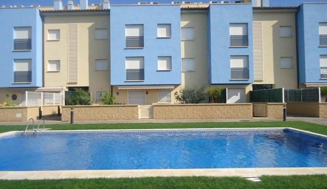 Ground floor with large terrace next to the beach