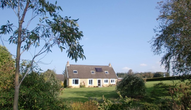 Large house on a working farm