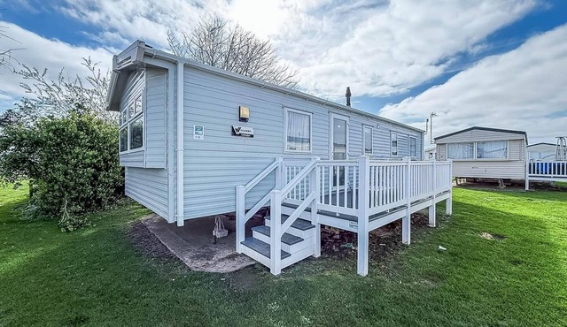 Lovely caravan with decking and outside furniture at Broadland Sands ref 20113BS
