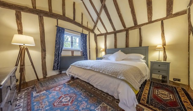 Medieval house with wonky beams and sloping wooden - Duke's Lodge