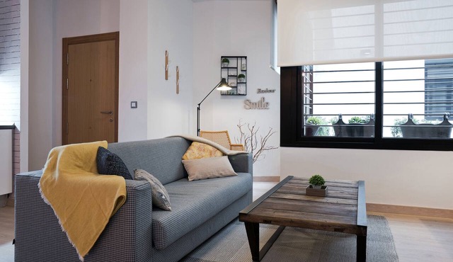 New 1-Bedroom Apt in Downtown Malaga with FREE Parking & Rooftop Pool