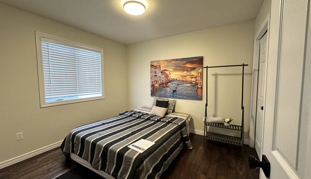 Nice home with cozy living room, large backyard, bedroom and bathroom.
