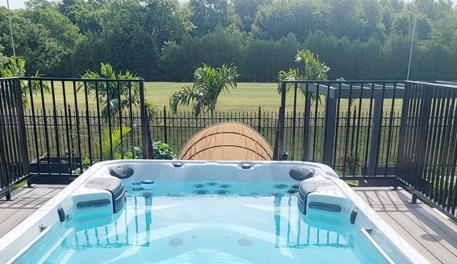 Oasis with swim spa and lake view