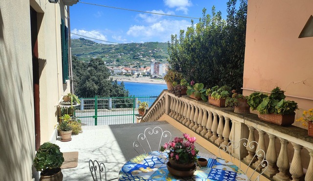 Panoramic apartment in villa on beach, in center