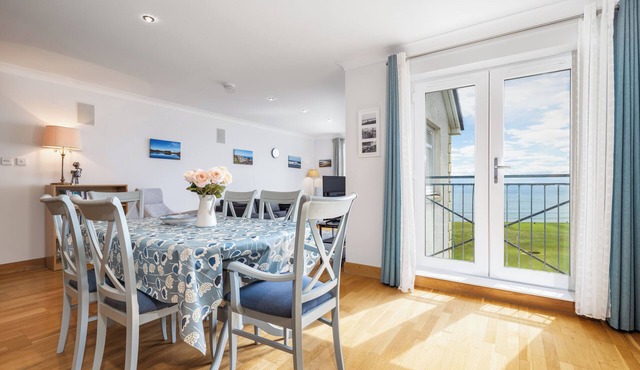 Second-floor 2-bedroom apartment with sea views overlooking the famous James Braid Brora Golf Course.