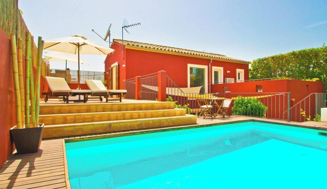 Stylish villa in Palma, with heated pool and private garden.