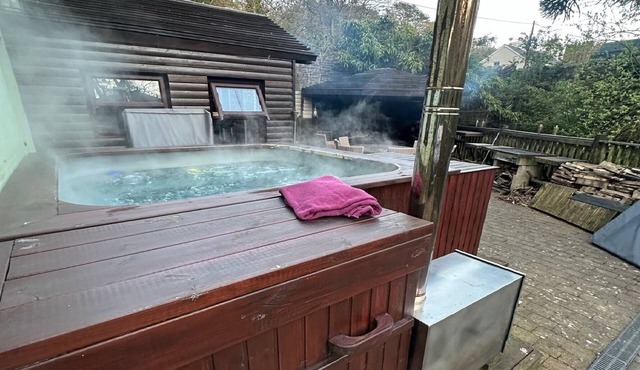 The hot tub by the waterfall - facilities included