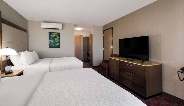 Unwind with Ease: 2 Convenient Rooms, Indoor Swimming Pool, and Free Shuttle