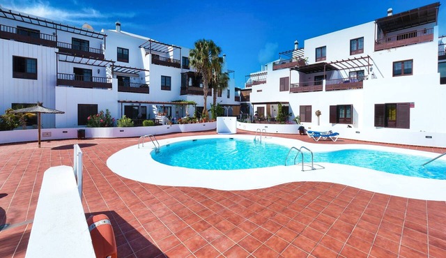 Vacation Apartment 'Casa Yare, Shared Pool, Air-con' with Sea View, Wi-Fi and Air Conditioning