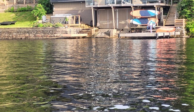 Waterfront reatreat with hot tub, fire pit, basket ball court and playgroung !