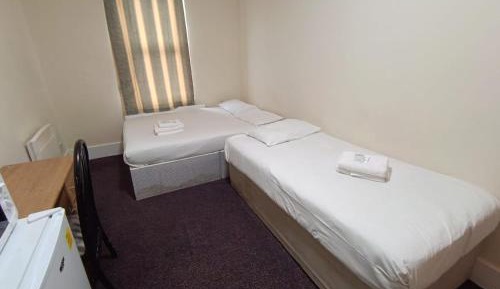 Quadruple Room with Shared Bathroom